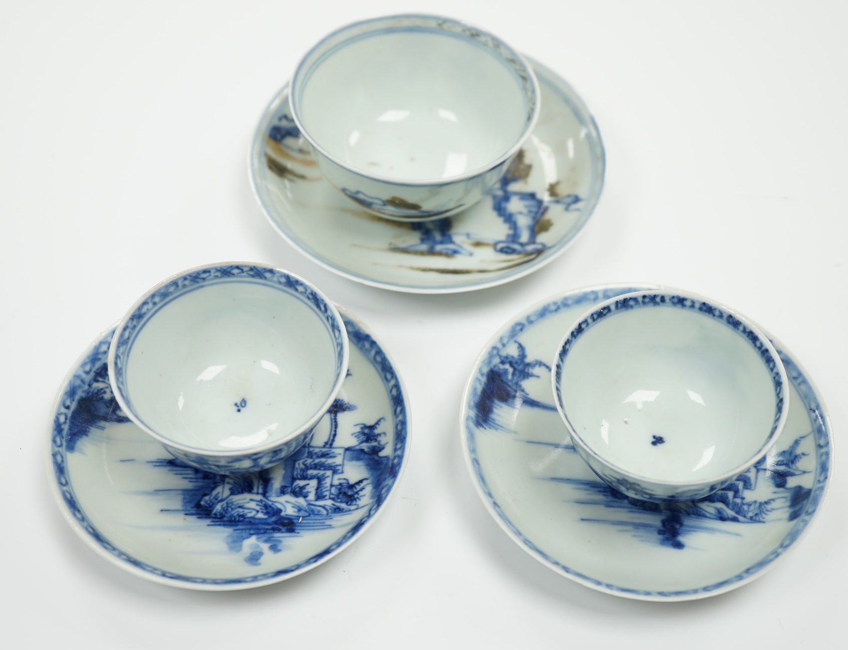 Three Chinese blue and white Nanking Cargo teabowls and saucers, largest 11.5cm diameter